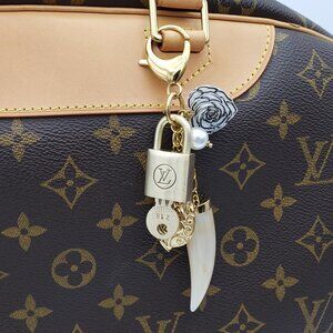 Authentic Louis Vuitton Padlock w/Unbranded Resin Horn Stainless Steel Keycharm